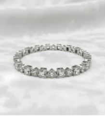 Silver color crystal bangle with alternating square and diamond geometric stones for artificial jewellery online shopping in Lahore.