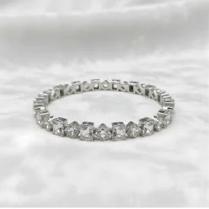 Silver color crystal bangle with alternating square and diamond geometric stones for artificial jewellery online shopping in Lahore.